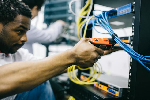 a-person-repairing-electricity-board